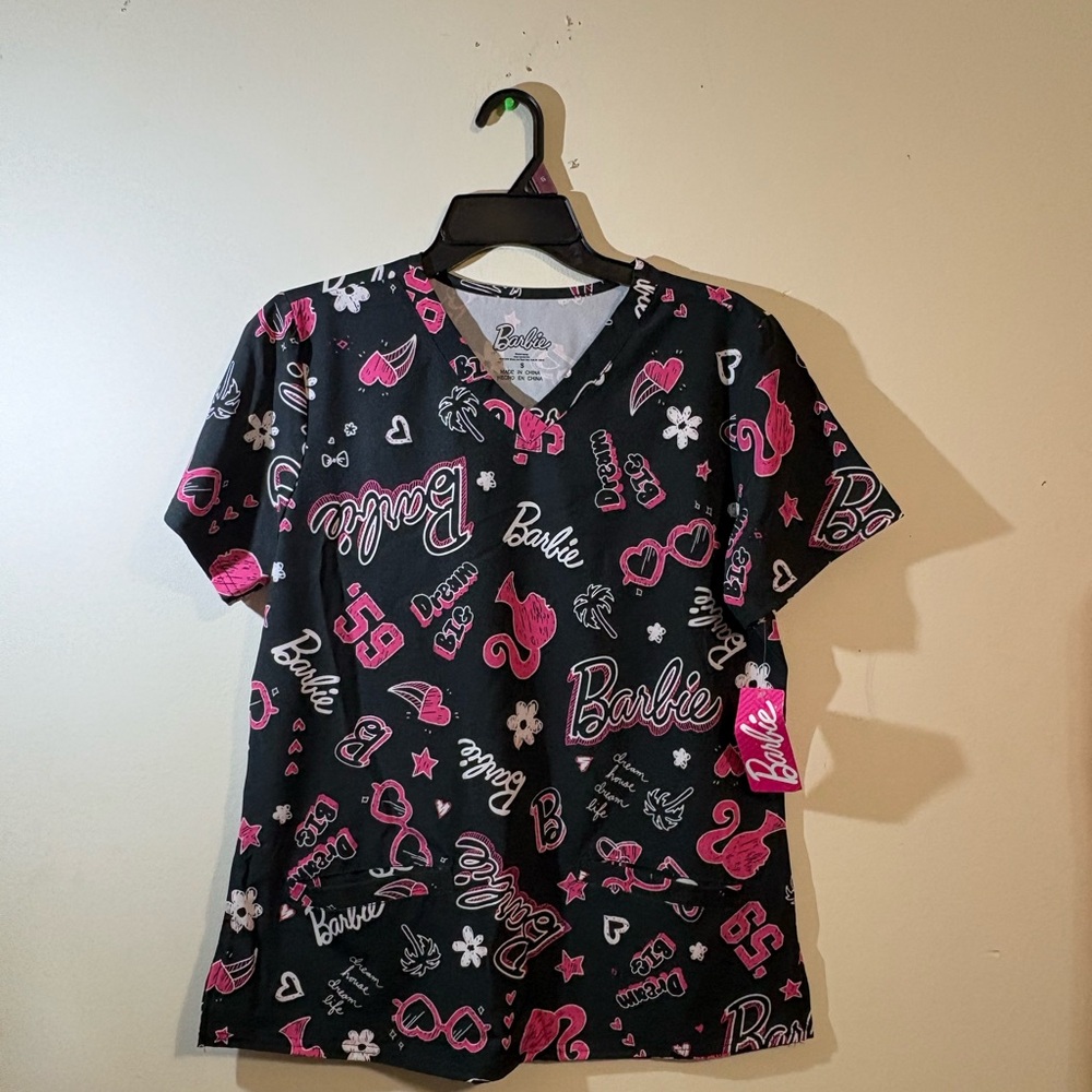 Barbie Mattel women's Small V-neck scrub top Black Pink pocket short sleeve NWT